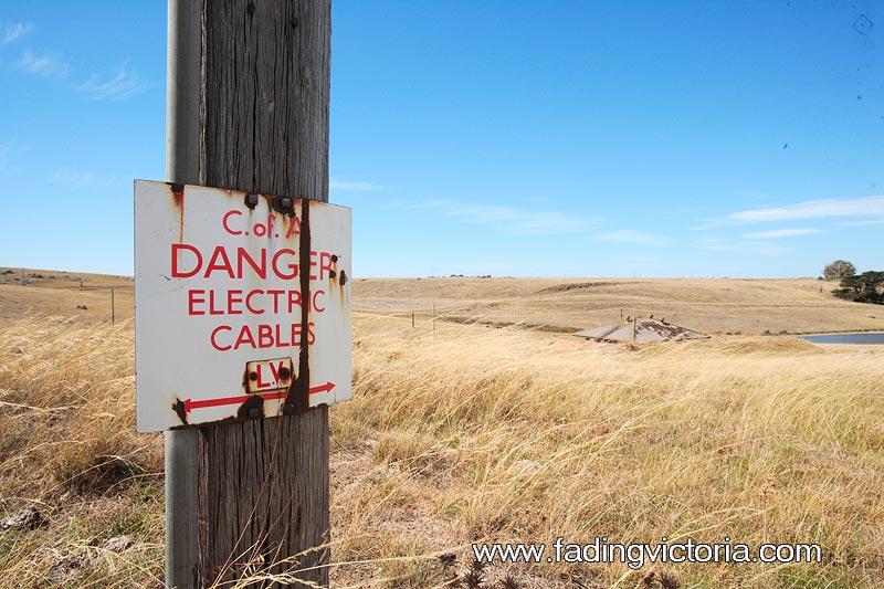 Sign warning of electric cables. 