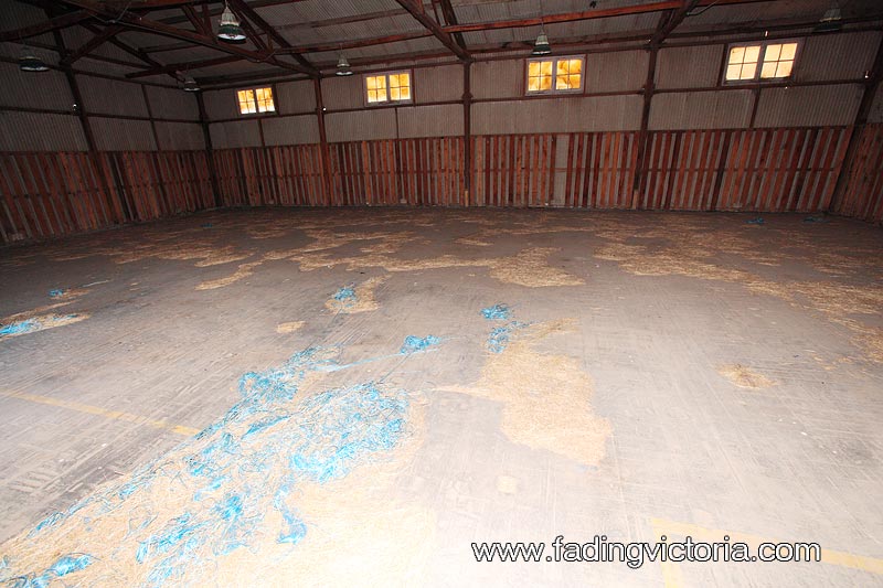 Interior. There's hay on the floor.