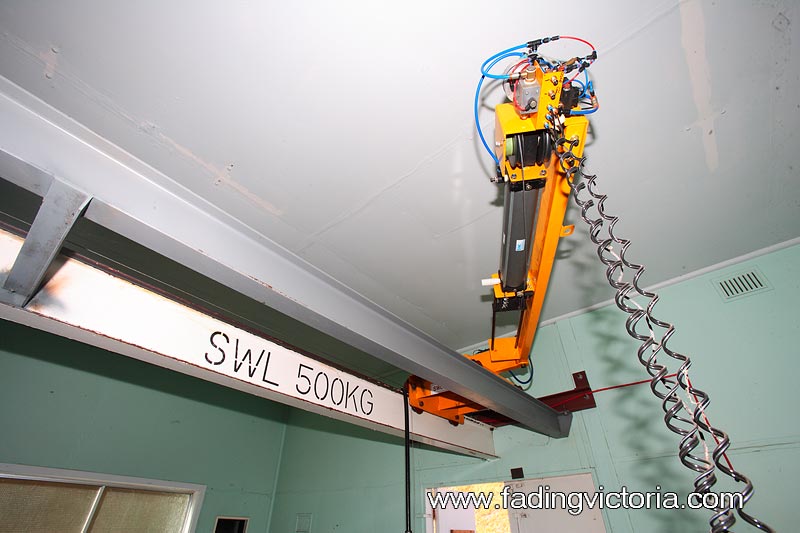 Robotic arm. This is probably the most modern thing in a base that looks very retro.