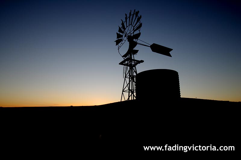 Sunset over old windmill