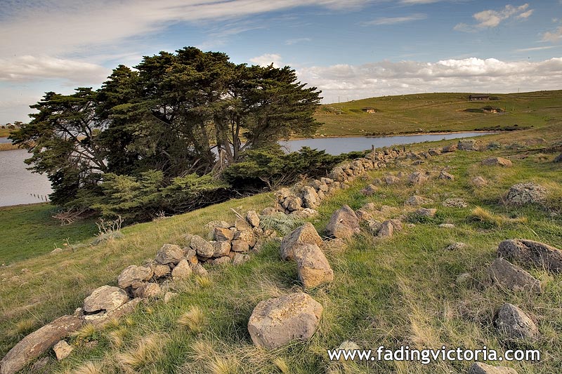 Stone wall inside former base