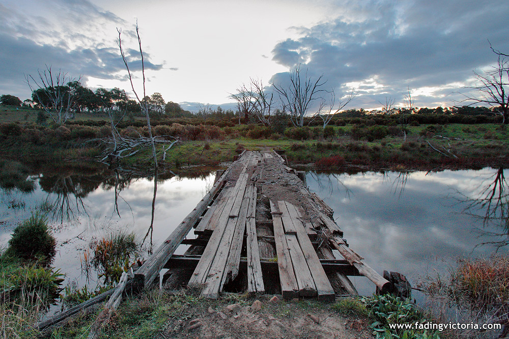 Sunset over old bridge